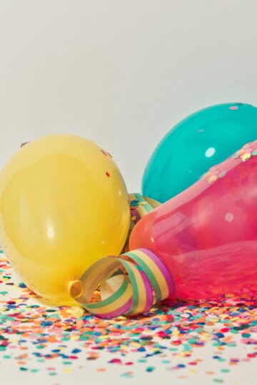 Photo by Ylanite Koppens: https://www.pexels.com/photo/colorful-balloons-with-confetti-796606/